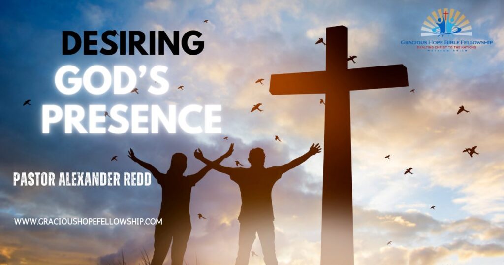 Desiring God’s Presence, Pastor Alexander Redd: two people raise their arms beside a cross at sunrise